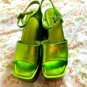 Woman’s 7 1/2 platform shoes. Worn once